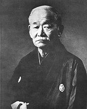 Jigoro Kano with black judoki